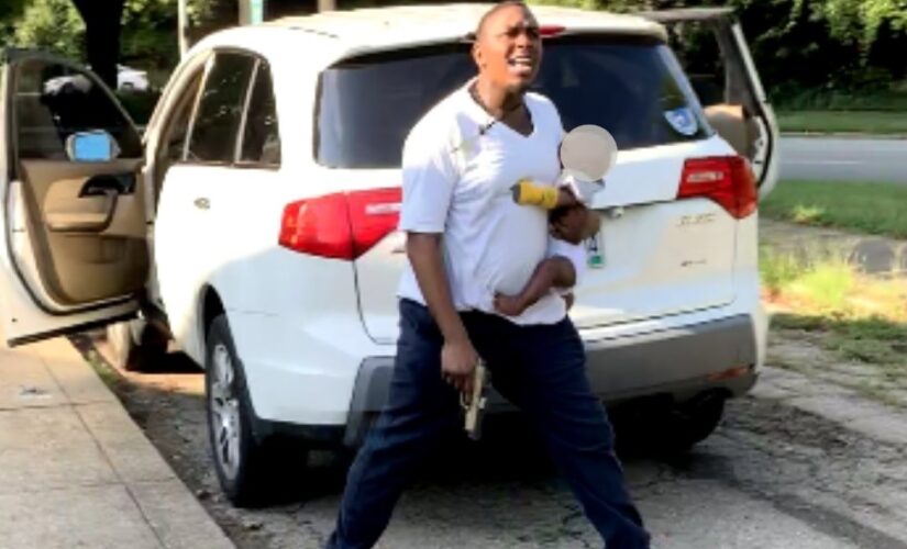 Ohio man holds baby as he shoots at, wounds woman following car crash