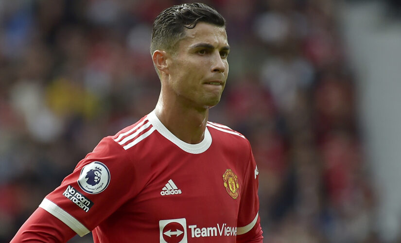 Banner targets Cristiano Ronaldo at Old Trafford showing support for rape accuser