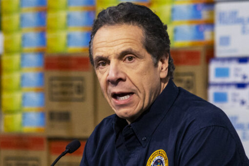 Andrew Cuomo gets kisses from his dog Captain on fishing trip