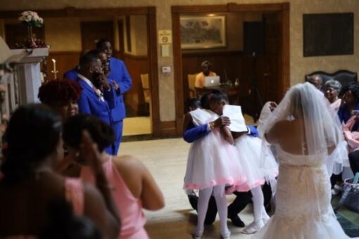 Groom surprises stepdaughters with adoption proposal at wedding: ‘It was priceless’