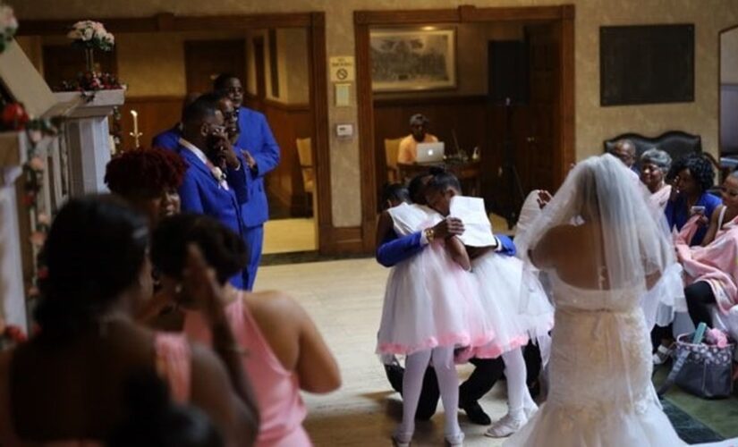 Groom surprises stepdaughters with adoption proposal at wedding: ‘It was priceless’