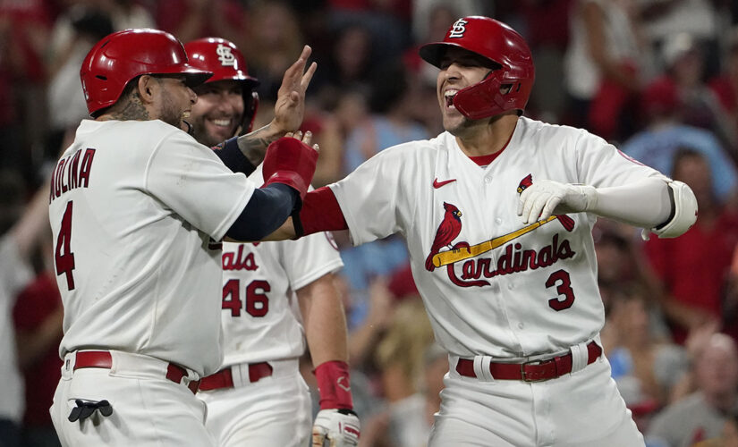Carlson homers twice, Mikolas gets first win in two years
