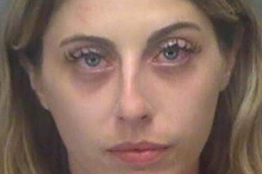 Naked woman, 28, drives golf cart into Florida standoff scene with armed suspect: reports