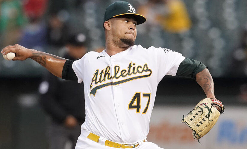 Montas reaches 200 Ks, A’s pound first-place Astros 14-2