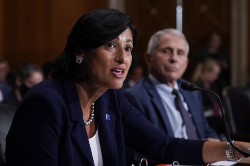 CDC director recommends COVID-19 booster for younger at-risk workers, defying advisory panel