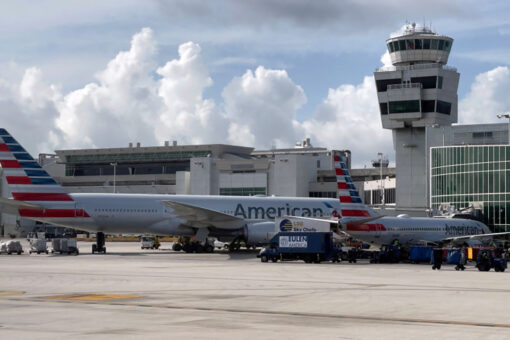 American Airlines passenger detained after allegedly opening emergency exit, walking on wing