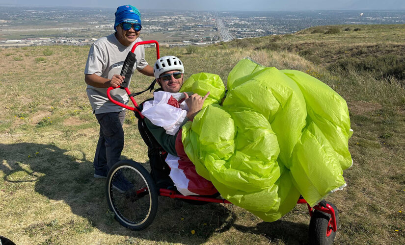 Former soldier flies solo with adaptive paragliding program