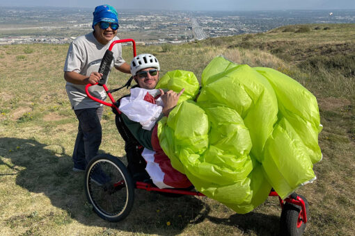 Former soldier flies solo with adaptive paragliding program