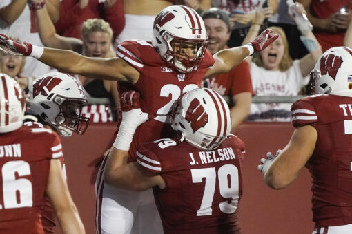 Mellusi powers No. 18 Wisconsin past Eastern Michigan 37-7