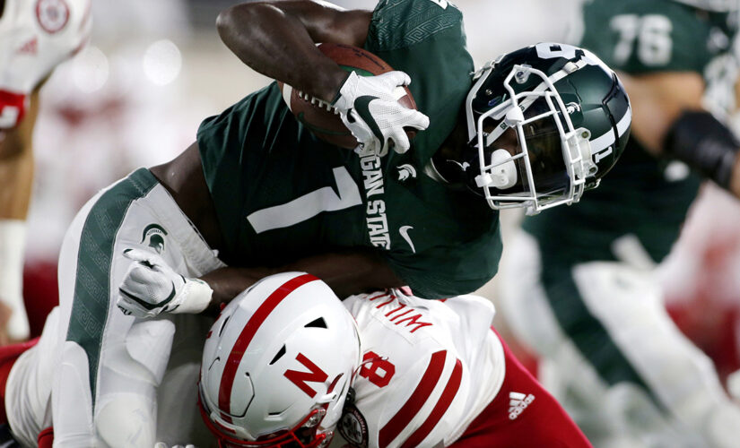 OT interception lifts No. 20 Spartans over Nebraska 23-20