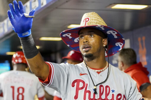 Segura, Nola lead surging Phils past Mets, tighten NL East