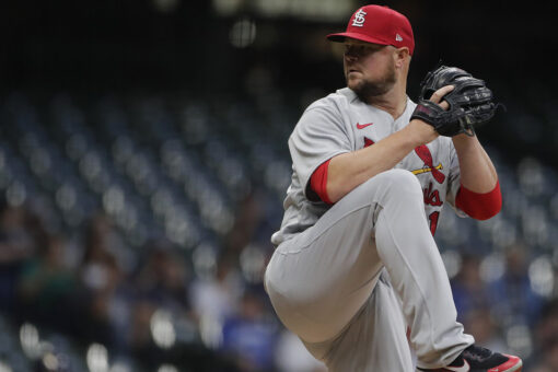 Lester wins 200th, Cards down Brewers for ninth straight win