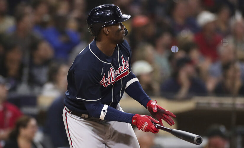 Soler, Braves win 10-8 in 10 innings to eliminate Padres