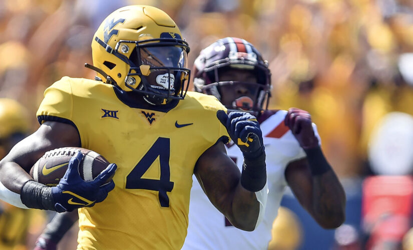 WVU builds big lead, holds on to beat No. 15 Va Tech 27-21