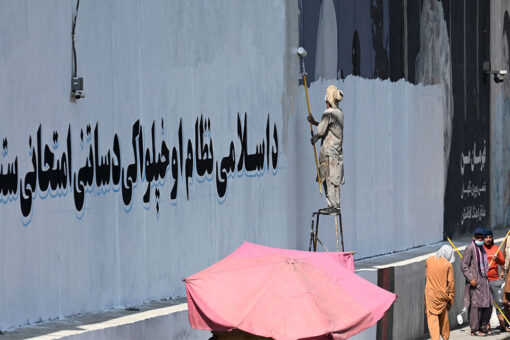 Taliban painting over western murals in Kabul, including George Floyd mural