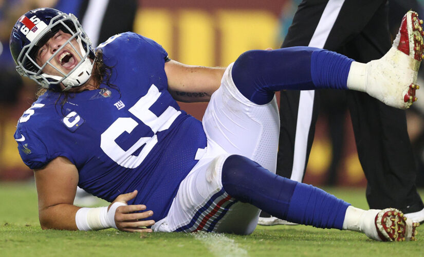 Giants’ Nick Gates leaves game on cart after suffering gruesome leg injury