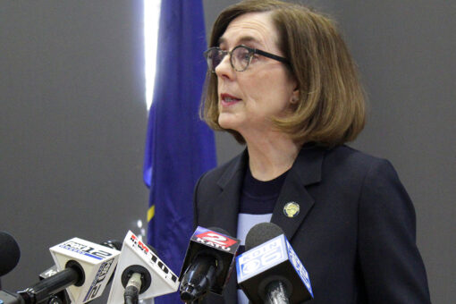 Oregon police, firefighters sue Gov. Kate Brown over vaccination mandate