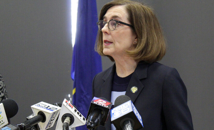 Oregon police, firefighters sue Gov. Kate Brown over vaccination mandate