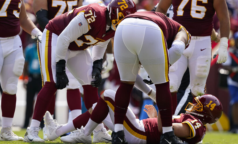 Washington’s Ryan Fitzpatrick leaves game after taking huge hit from Chargers defender