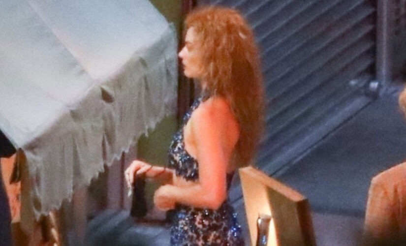 Margot Robbie looks unrecognizable as she rocks racy outfit for filming of ‘Babylon’