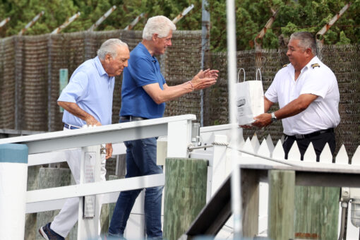 Bill Clinton spotted in Hamptons boarding yacht with Epstein-connected billionaire sugar baron brothers
