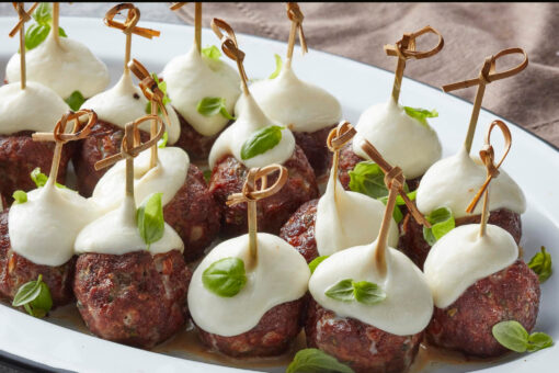 Smoked hickory meatball skewers with mozzarella for football season