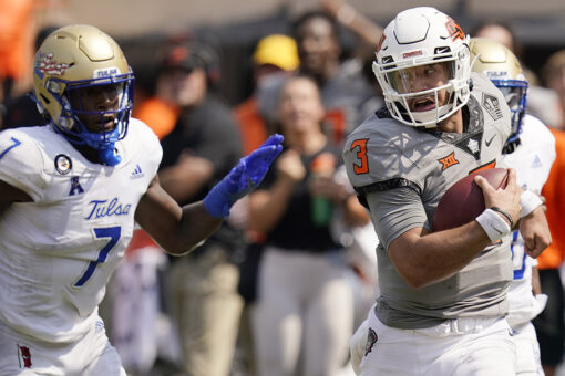 Oklahoma St holds off rival Tulsa 28-23 in Sanders’ return