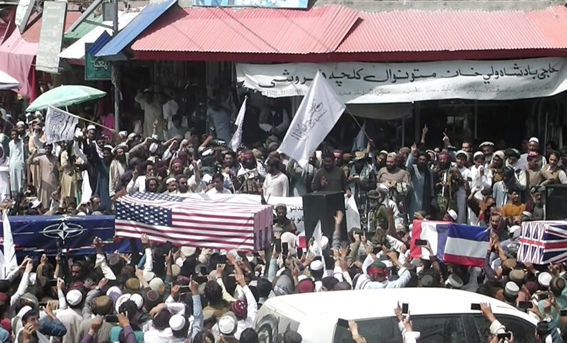 Taliban supporters hold mock funerals for with coffins draped with American flags