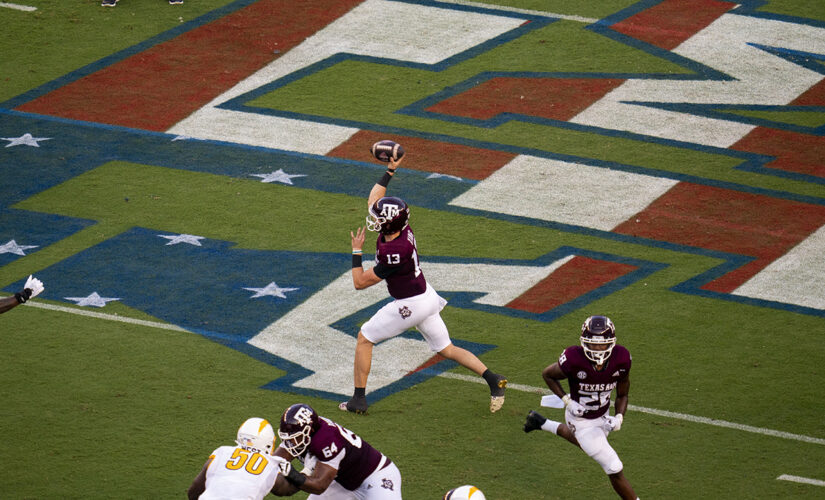 Aggie yell leader reminds fans not to shout vulgar language