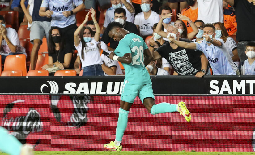 Vinícius Júnior, Benzema lead Madrid to 2-1 win at Valencia