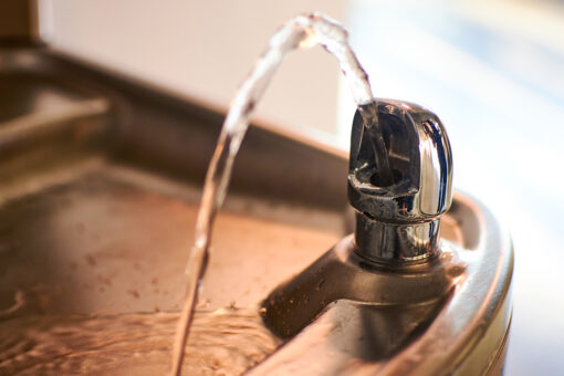 Photo of ‘White’ sign ‘unintentionally’ placed on water fountain, school says