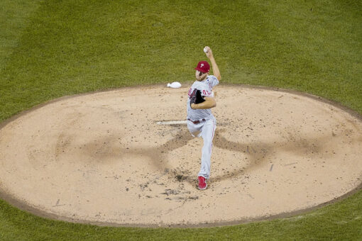 Wheeler, Phillies hold off Mets 4-3 to boost playoff hopes