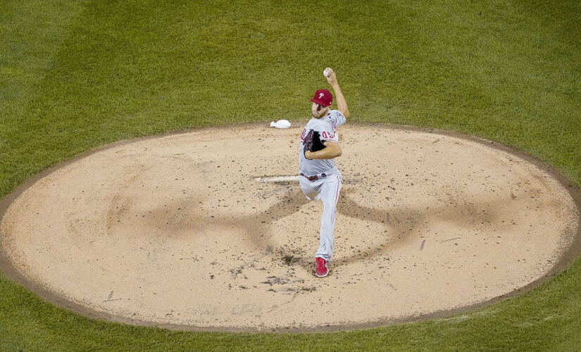Wheeler, Phillies hold off Mets 4-3 to boost playoff hopes