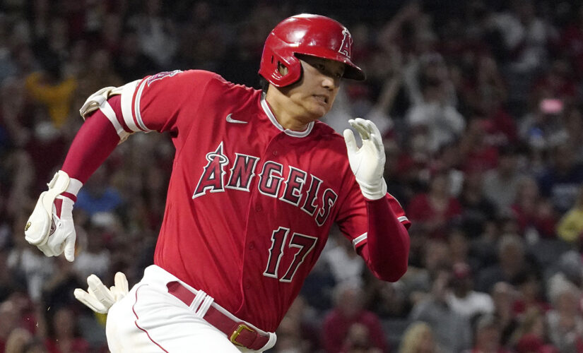 Ohtani hits consecutive triples, Angels rout Mariners 14-1