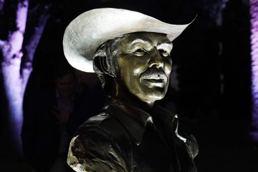 Bronze sculpture of Burt Reynolds unveiled at his gravesite 3 years after his death