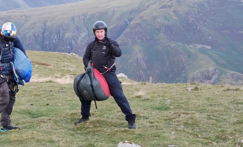 Tom Cruise surprises hikers after landing helicopter, parachuting off cliff