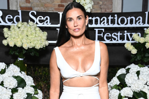 Demi Moore showcases abs in striped bikini: ‘Leaping into fall!’
