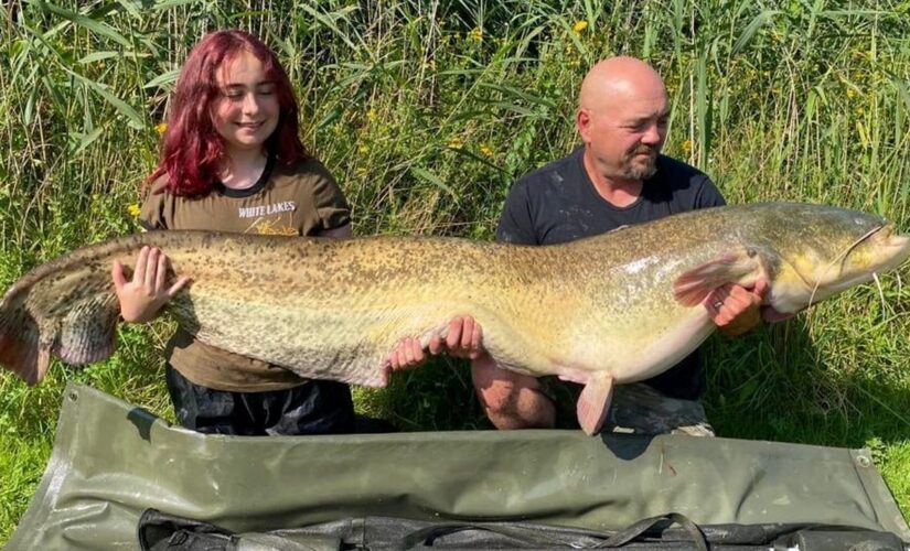 Teen catches giant catfish minutes after doubting her luck, father says