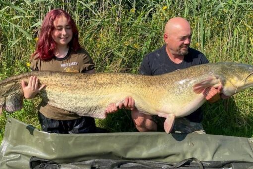 Teen catches giant catfish minutes after doubting her luck, father says