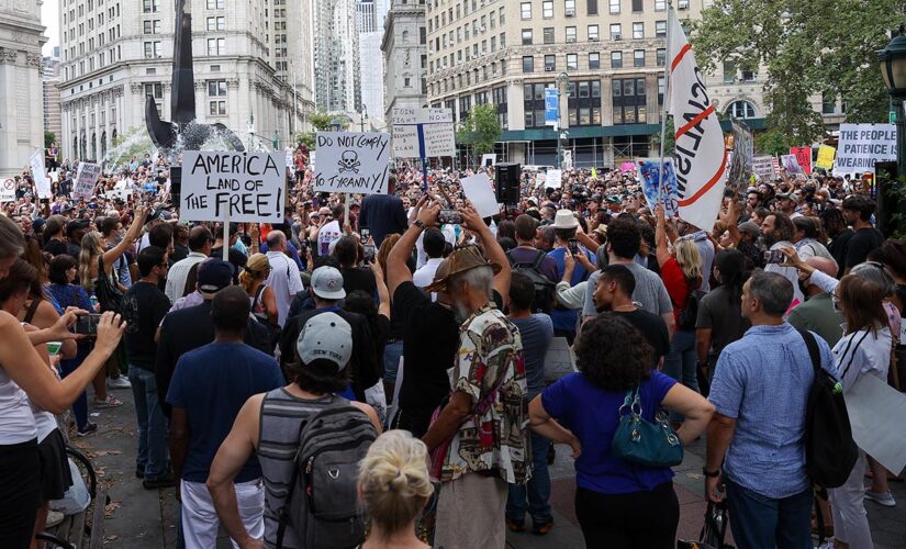 New York teachers protest vaccine mandates, march across Brooklyn Bridge