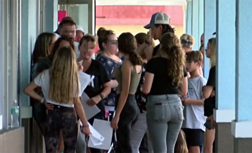 Florida school district updates mask policy after hundreds line up outside chiropractor for mask opt-out