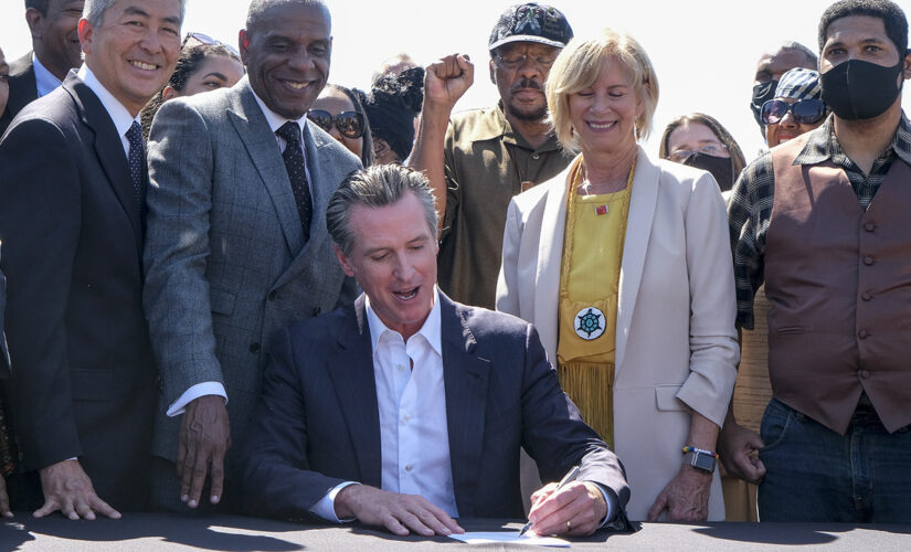 Gavin Newsom signs bill to return seized beachfront land to Black couple’s descendants