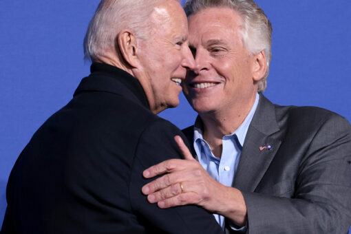 McAuliffe dances onstage next to Biden and internet chimes in