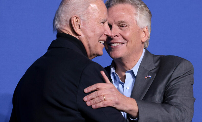 McAuliffe dances onstage next to Biden and internet chimes in