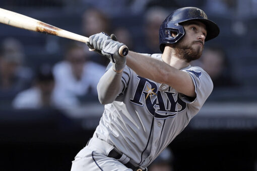 Lowe hits 3 HRs, Rays roll 12-2 to prevent Yankees WC clinch