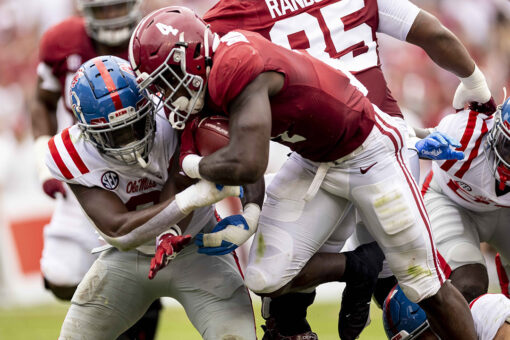 Robinson, defense push No. 1 Bama past No. 12 Ole Miss 42-21