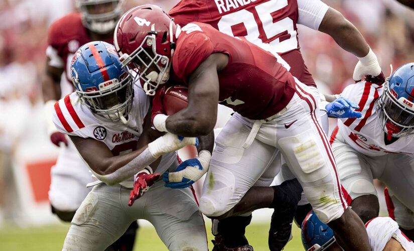 Robinson, defense push No. 1 Bama past No. 12 Ole Miss 42-21