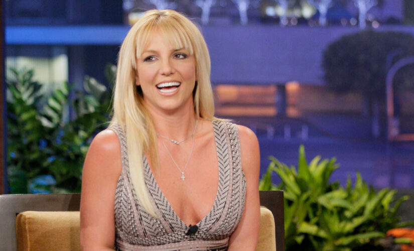 Britney Spears slams ‘consultations for body improvements’ in topless photo post: ‘Rather fall off a cliff’