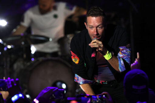 Chris Martin honors girlfriend Dakota Johnson during Coldplay concert: ‘This is about my universe’