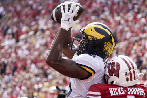 No. 14 Michigan rips Wisconsin 38-17; Badgers’ Mertz injured